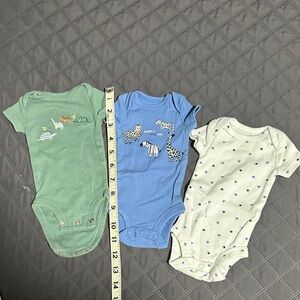 Carter's Green, Blue, and Cream Baby Onesies Set